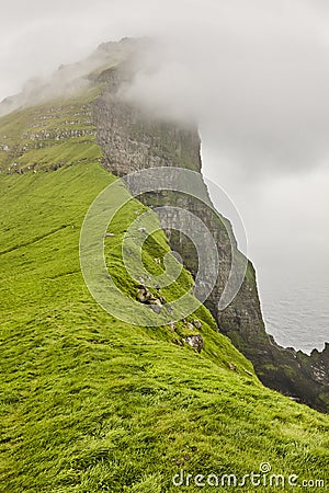 Faroe islands landscape with cliffs and atlantic ocean. Mikladalur, Kalsoy Stock Photo