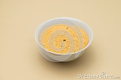 Farofa, typical brazilian manioc flour side dish on ceramic Stock Photo