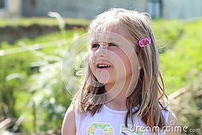 Fascinated little girl Stock Photo