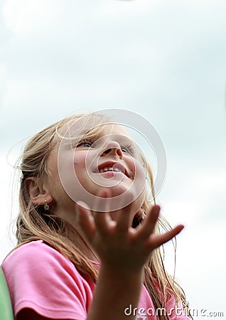 Fascinated little girl Stock Photo