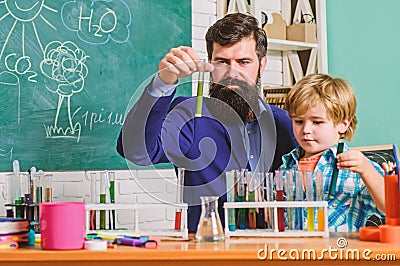 Fascinating chemical reaction. Interesting school classes. School education. School chemistry experiment. Teacher and Stock Photo