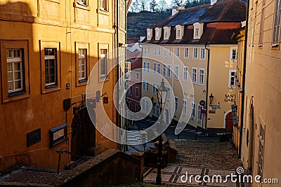 Fascinating narrow picturesque street Jansky vrsek with baroque and renaissance historical buildings, beautiful cityscape, sunny Editorial Stock Photo