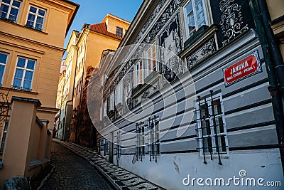 Fascinating narrow picturesque street Jansky vrsek with baroque and renaissance historical house richly decorated with sgraffito, Editorial Stock Photo