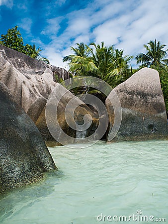 The fascinating rock formations on the beach of the Seychelles. Stock Photo