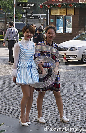 Fascinating streets and trades of Shanghai, China: local fashion wears many styles Editorial Stock Photo