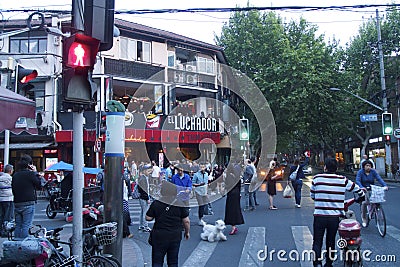 Fascinating streets and trades of Shanghai, China: Yongkang lu the perfect place to quench a thirst... Editorial Stock Photo