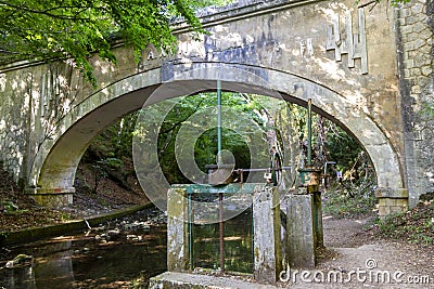 Fascio bridge on stream Stock Photo