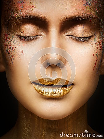 Fashion Art Makeup, Creative Beauty Face Lips Make Up, Gold Lipstick Closed Eyes in Color Dust Paint Stock Photo