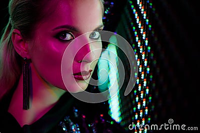Fashion photo of sexy girl dressed in black in the night-club. Night club girl neon concept. Stock Photo