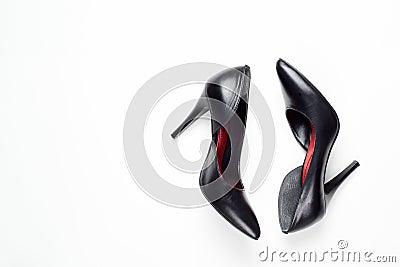 Black woman shoes on white background. Flat lay, top view trendy fashion feminine background. Beauty blog concept. Stock Photo