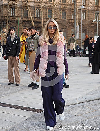 MILAN, Italy: 20 February 2019: Fashion bloggers street style outfits Editorial Stock Photo