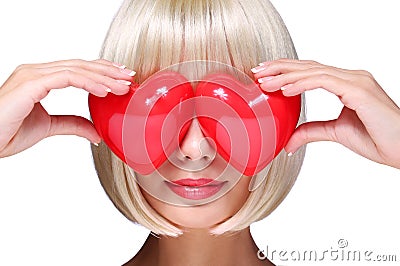 Fashion Blonde Girl with Red Hearts in Valentines Day. Glamorous Stock Photo