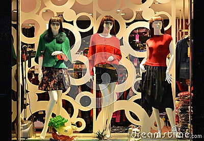 Fashion boutique display window with mannequins, store sale window, front of shop window Stock Photo