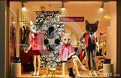 Fashion boutique display window with mannequins, store sale window, front of shop window Stock Photo