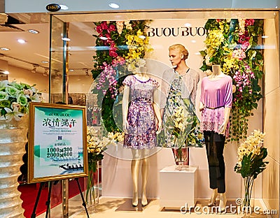 fashion boutique clothes shop clothing store window Editorial Stock Photo