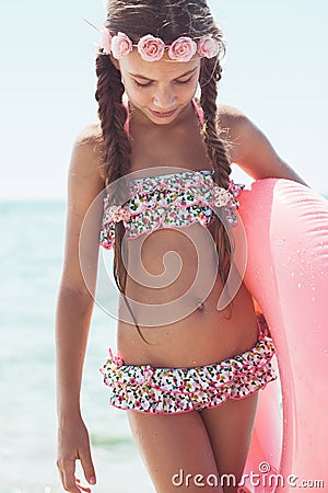 Fashion child at the beach Stock Photo