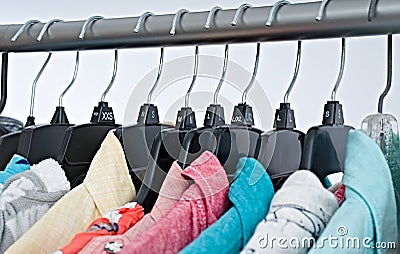 Fashion clothes on clothing rack ,colorful closet Stock Photo