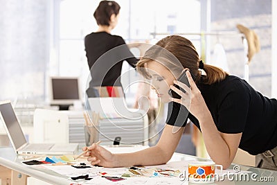 Fashion designer in office Stock Photo