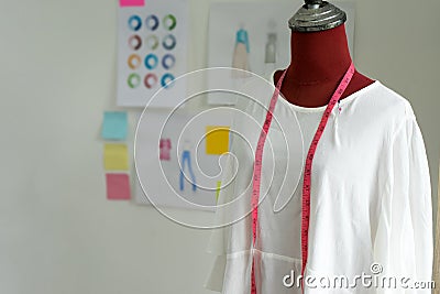 fashion designer work in the studio with graphic and tailor tool Stock Photo