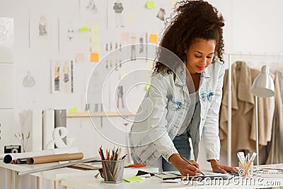 Fashion designer working in atelier Stock Photo