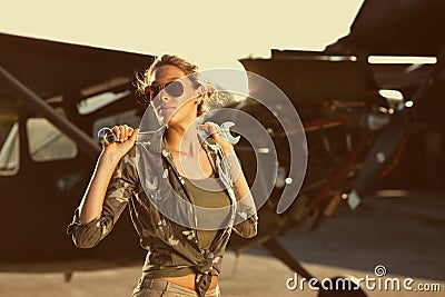 Fashion Female airplane mechanic Stock Photo