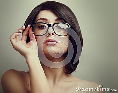 Fashion female model holding the hand glasses Stock Photo