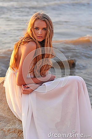 Fashion girl in a white dress Stock Photo