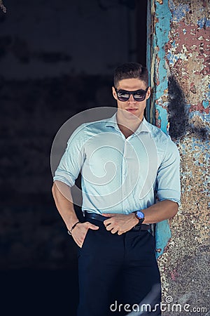 Fashion handsome young man with cuffed sleeves Stock Photo