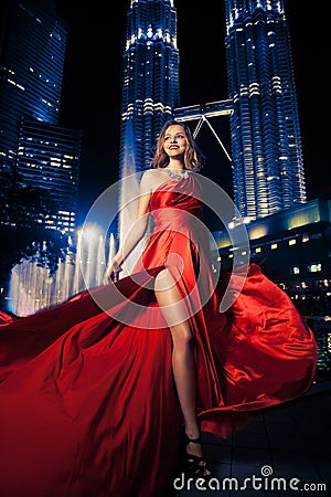 Fashion Lady In Red Dress And City Lights Stock Photo