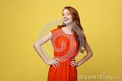 Fashion and Lifestyle Concept: Studio shot of attractive self confident young female in great mood feeling happy Stock Photo
