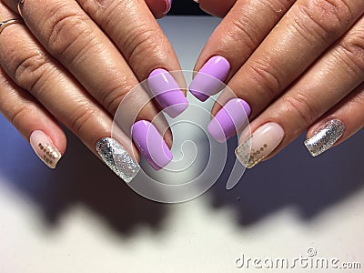 Fashion lilac manicure with silver design Stock Photo