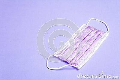 Fashion lilac masks isolated on glamour purple background Stock Photo