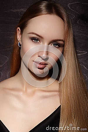 Fashion long hair. Beautiful blond girl. Healthy straight shiny hair style. Beauty woman model. Smooth hairstyle Stock Photo