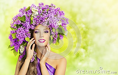 Fashion Model Girl Lilac Flowers Hair Style. Woman Nature Hat Stock Photo