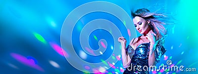 Fashion model sexy woman dancing in neon light. Disco dancer posing in UV colorful light Stock Photo