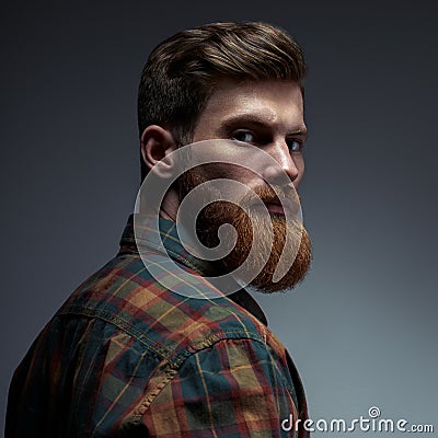 Portrait of a man with beard and modern hairstyle Stock Photo