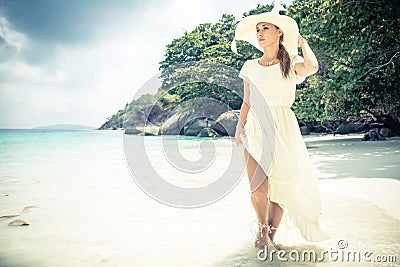 https://thumbs.dreamstime.com/x/fashion-model-tropical-beach-beautiful-woman-long-white-dress-hat-walking-crystalline-water-idyllic-53888566.jpg