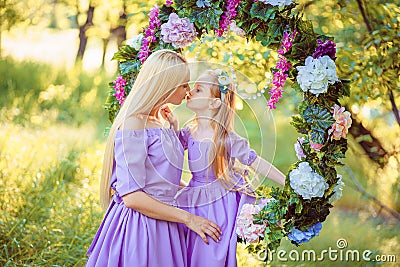 fashion outdoor photo of beautiful family look. beautiful mother Stock Photo