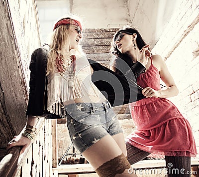 Fashion portrait of a beautiful young womans wearing sunglasses. Stock Photo