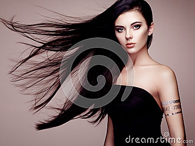 Fashion portrait of elegant woman with magnificent hair Stock Photo