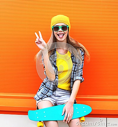Fashion portrait of hipster cool girl in sunglasses Stock Photo