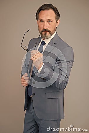 Fashion portrait of man. bearded man after hairdresser. portrait of mature man wearing glasses. adult financial director Stock Photo
