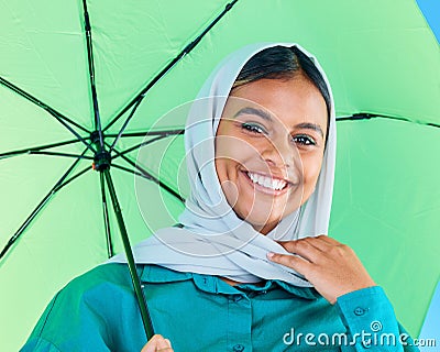 Fashion portrait, Muslim and happy woman with umbrella, designer brand clothes or casual outfit style. Trendy gen z Stock Photo