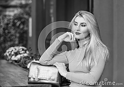 Fashion purse. Pretty woman and her beautiful purse. Womanhood concept. Comfy format. Fashionable female accessory Stock Photo