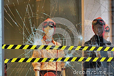 Fashion retail store glass window damaged during the riot protest against lockdown and related economic crisis Editorial Stock Photo