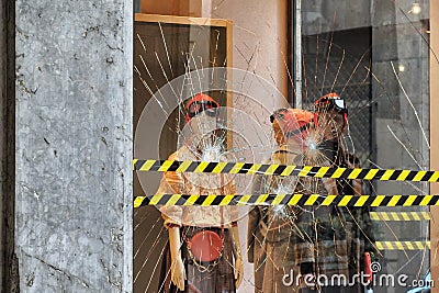 Fashion retail store glass window damaged during the riot protest against lockdown and related economic crisis Editorial Stock Photo