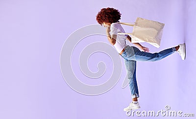 Fashion, shopping and a woman walking on mockup in studio on a purple background for advertising. Retail, commerce and Stock Photo