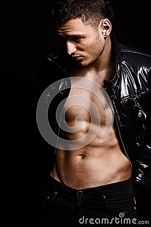 Fashion shot of muscular handsome man Stock Photo