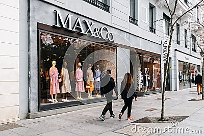 Fashion storefront in Serrano Street a luxury shoppingl street in Madrid Editorial Stock Photo