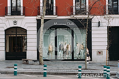 Fashion storefronts in Serrano Street a luxury shoppingl street in Madrid Editorial Stock Photo